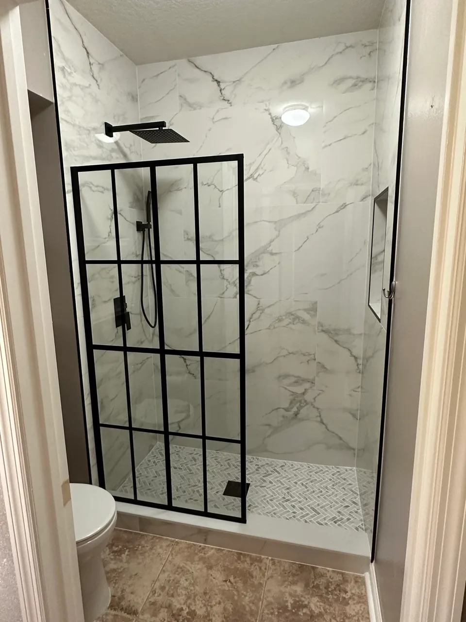 Finished walk-in shower remodel by Contemporary Flooring & Bath